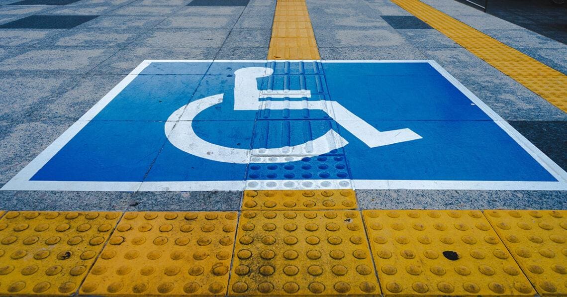 Long Covid Invisible Disabilities Revisiting ADA Compliance For 2024   Accessible Parking Space 1140x597 