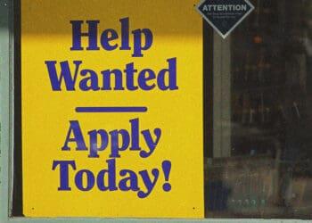 help wanted sign in business window